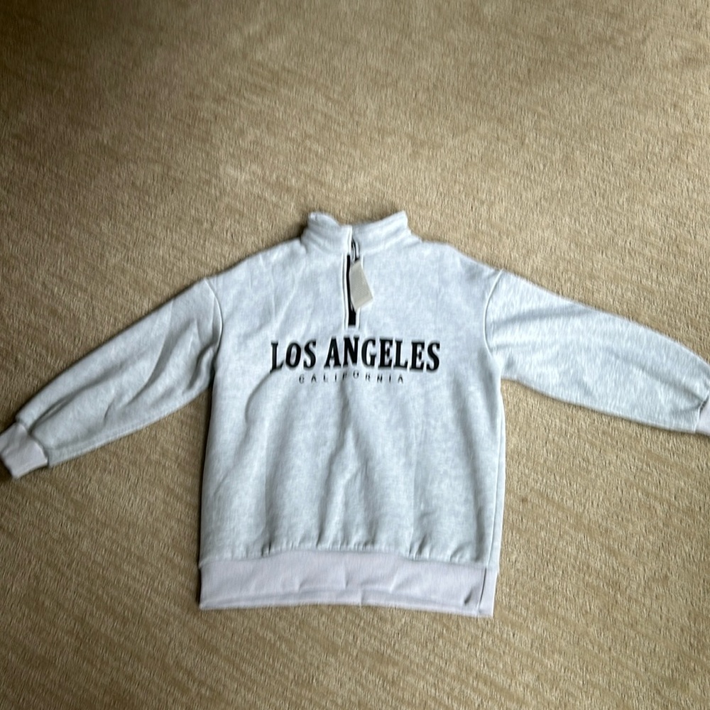 New never worn sweat shirt